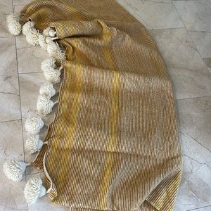 Moroccan wool throw with pom pom tassel detail